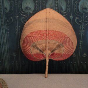 vintage wicker fan wall decor